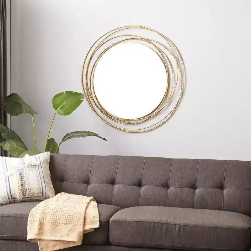 Miroir mural en métal avec cadre à anneaux superposés Or - Olivia & May : Style contemporain, cadre en fer, 97,4 cm