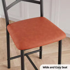 Lot de 4 tabourets de bar, tabourets de bar hauteur comptoir avec assise rembourrée en PU, chaises de bar de cuisine avec cadre en métal de 66 cm avec dossier en X et repose-pieds