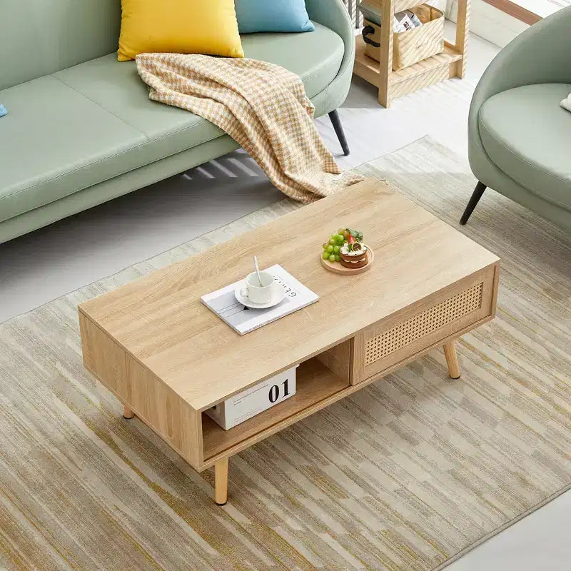 Table basse moderne en rotin JVNOXK de 105 cm avec porte coulissante de rangement, pieds en bois massif, adaptée au salon, dispose d'un espace de rangement, naturelle
