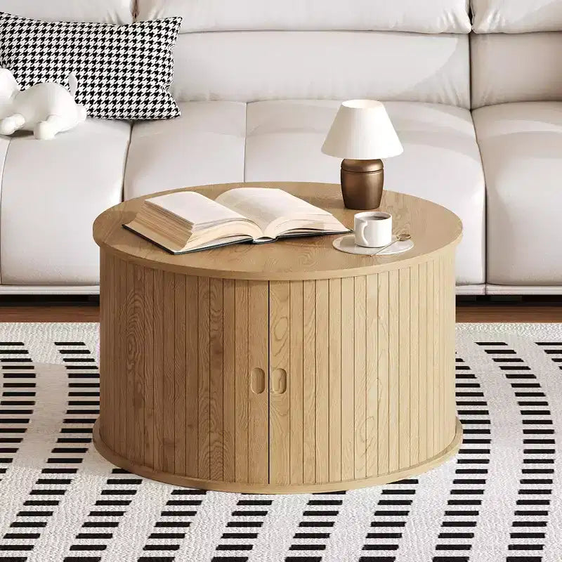 Table basse ronde GustoWave 28, Table d'appoint cannelée Mid-Century avec rangement à porte coulissante, Meuble de salon moderne