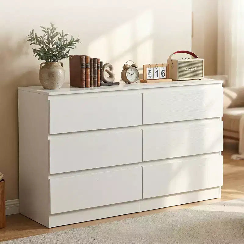 Commode blanche à 6 tiroirs, commode moderne pour chambre à coucher avec plateau spacieux, meuble en bois avec poignées dissimulées et 6 tiroirs profonds pour chambre à coucher
