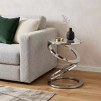 Table d'appoint ronde abstraite HomeRoots 17 en verre clair et aluminium argenté