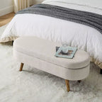 Banc de rangement ovale avec pieds en hévéa, Pouf capitonné moderne - ModernLuxe