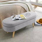 Banc de rangement ovale avec pieds en hévéa, Pouf capitonné moderne - ModernLuxe
