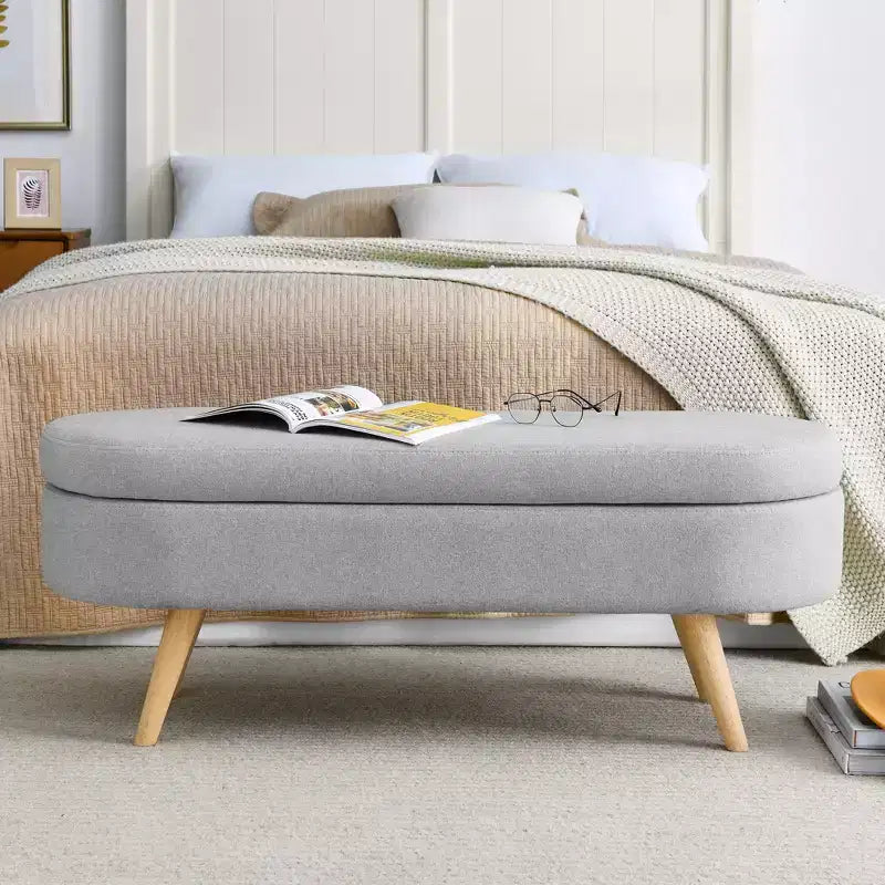 Banc de rangement ovale avec pieds en hévéa, Pouf capitonné moderne - ModernLuxe
